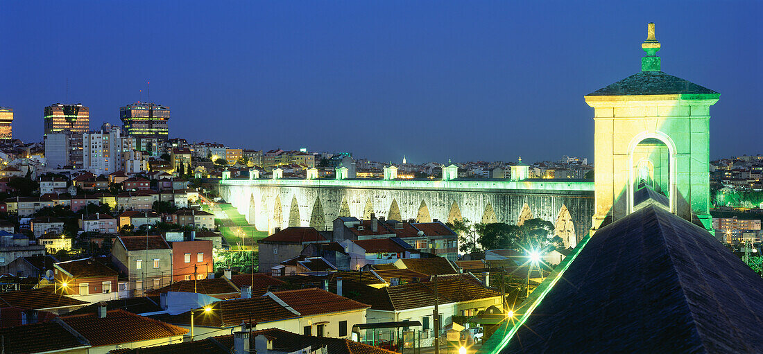 Aqueduct at night, Aqueducto das Aguas Livres and Towers of the Amoreiras shopping center, Algarve, Lisbon, Portugal, Europe