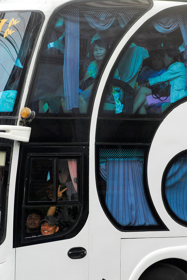 Thai tourists in a bus, Phuket, Thailand