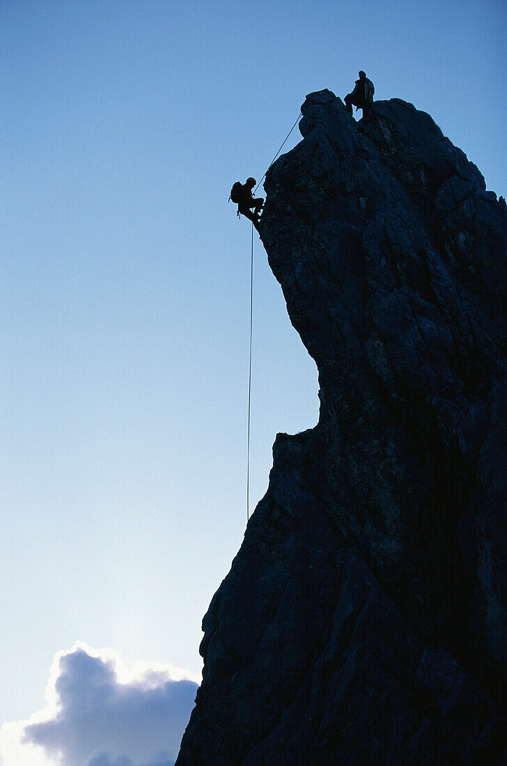 Climbers on mount Alpspitze, Garmisch Partenkirchen, Bavaria, Germany