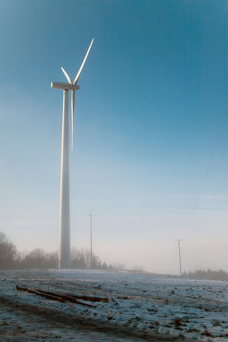 Wind Engine in the morningsun in winter, Brandenkopf Mountain, Black Forest, Germany