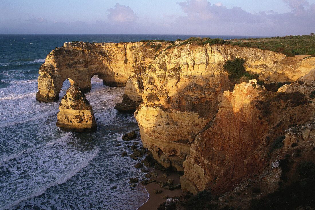 Rocky cliffs and coastal landscape, Praia da Marina, Carvoeiro, Algarve, Portugal