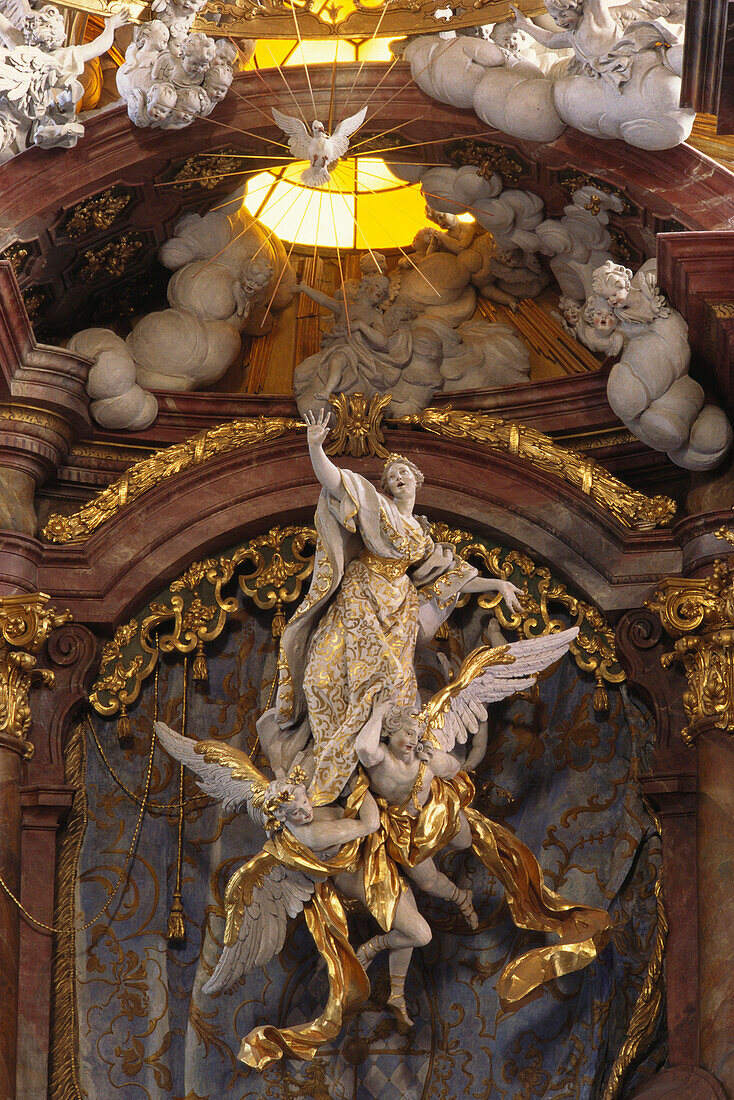Sculptures of the Assumption of virgin Mary at altar in the abbey church of Rohr, Lower Bavaria, Germany