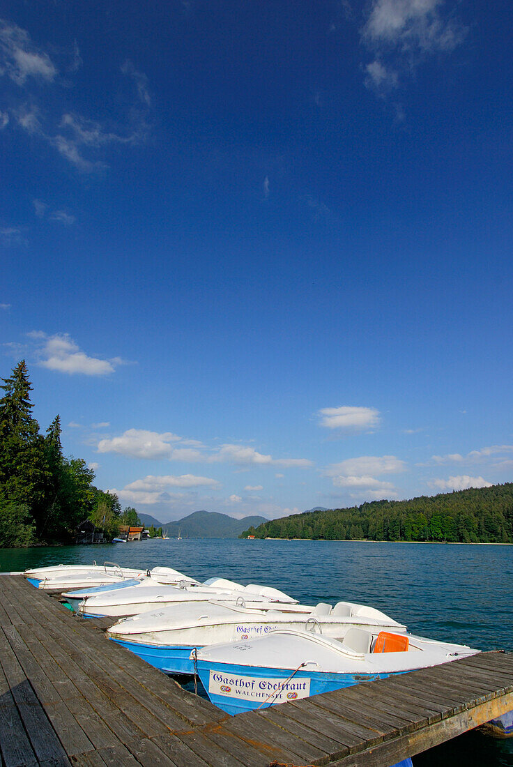 landing stage with white-blue rowing boats, lake Walchensee, Upper Bavaria, Bavaria, Germany