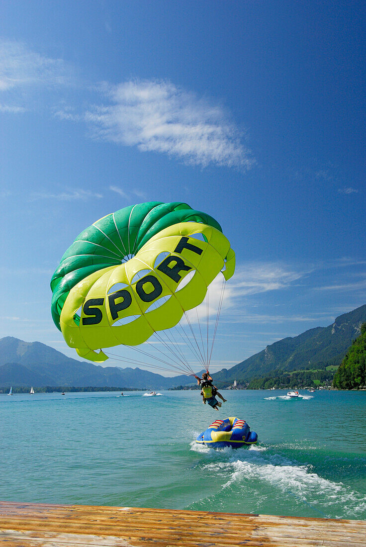 Tandem flight, parasailing at lake Abersee (lake Wolfgangsee), Salzkammergut, Salzburg, Austria