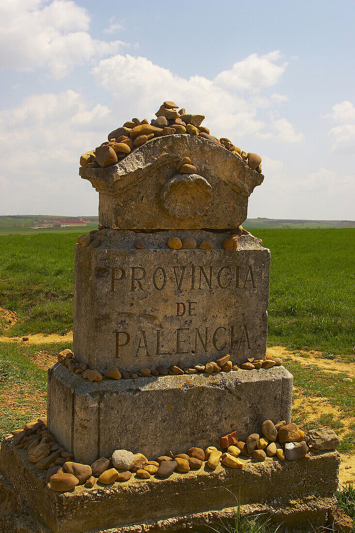 Landscape with boundary stone, province stone, Camino de Santiago, Castilla Leon, Spain
