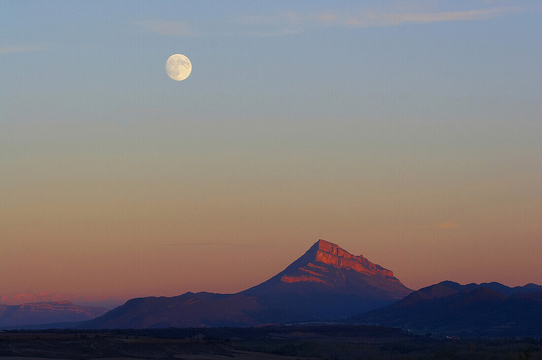 View towards Mount Oroel at sunset with full moon, Mountain, Aragon, Spain, Europe