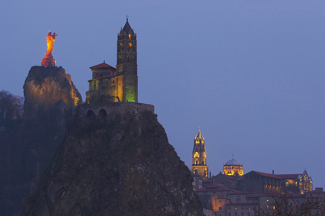 Evening view of cathedral Notre-Dame du Puy, Rocher Corneille with statue Notre-Dame de France, Chapelle St. Michel d'Aiguilhe, Via Podiensis, Le Puy-en-Velay, Department Haute-Loire, France, Europe