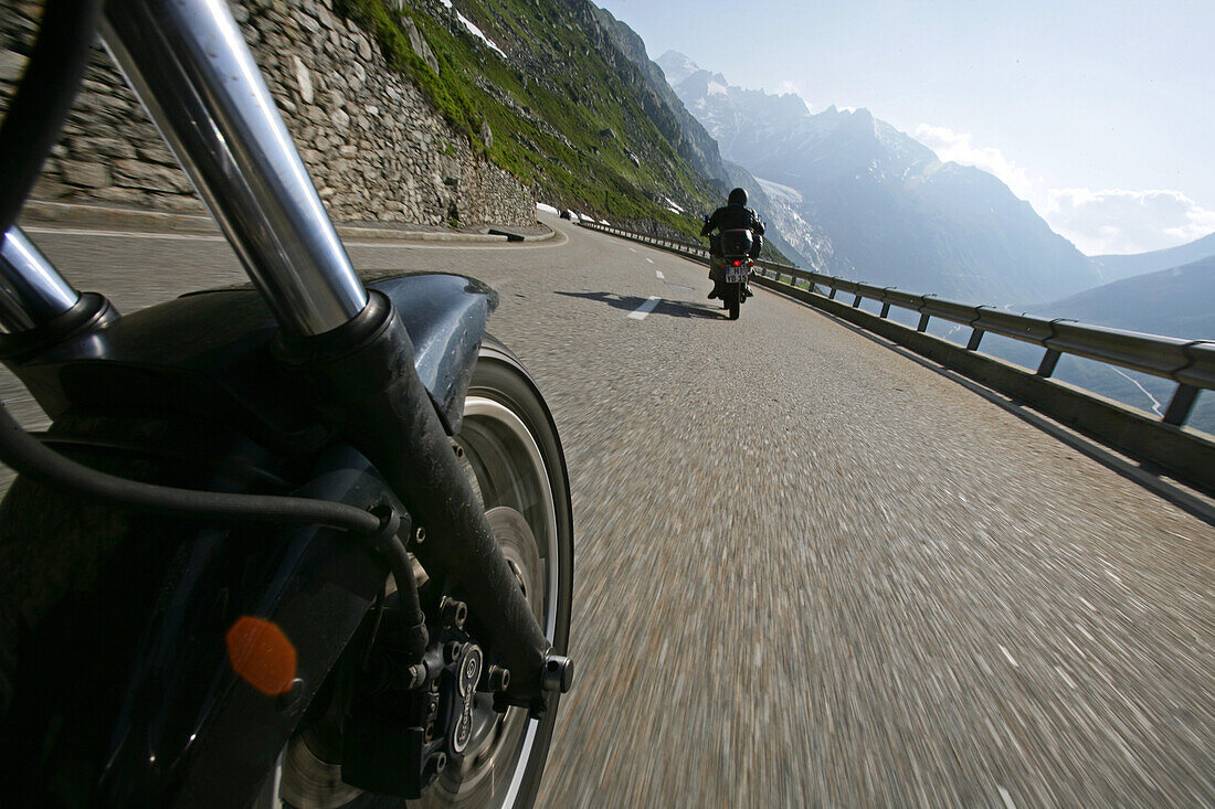 Motorbike tour in June across the Alps, front wheel, action, movement, Grimsel Pass, Canton Berne, Switzerland, Europe