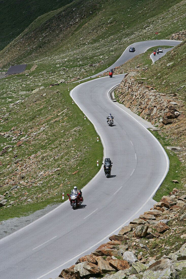 Biker on Timmelsjoch Hochalpenstrasse, Tyrol, Austria