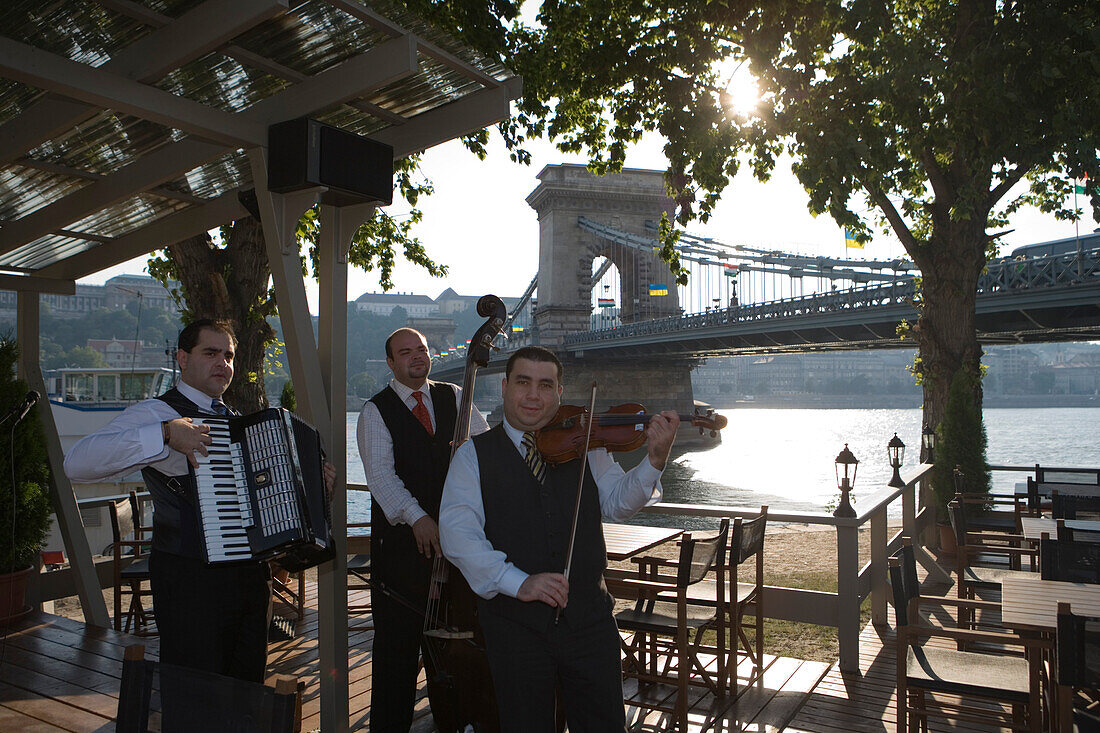 Musicians at Outdoor Cafe and Chain Bridge over Danube River, Pest, Budapest, Hungary