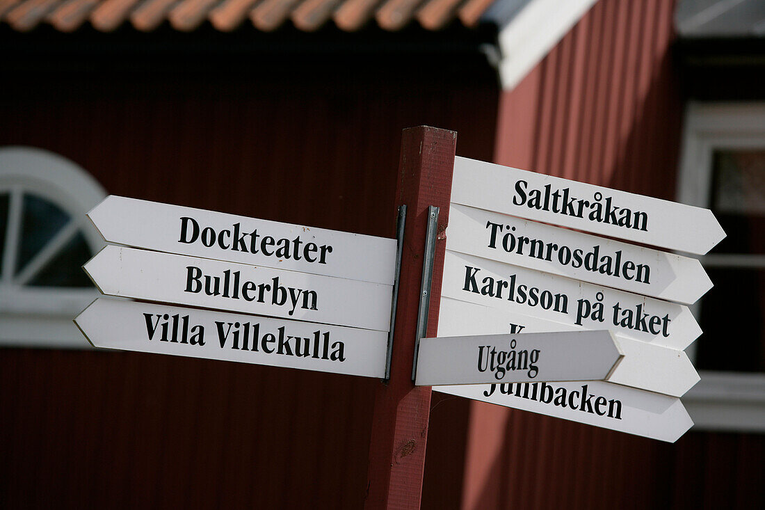 Signposts to different attractions in amusement park Astrid Lindgren World, Vimmerby, Smaland, Sweden