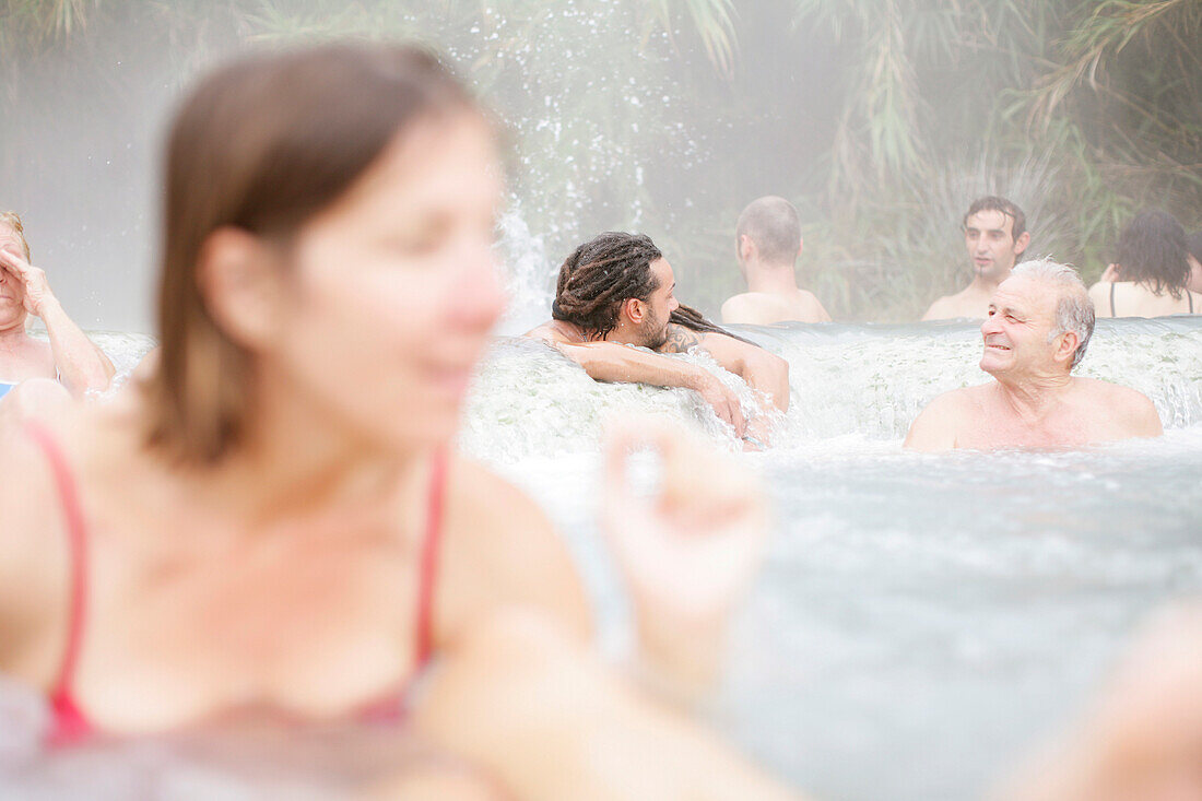 People in hot sulfur springs, Saturnia, Tuscany, Italy