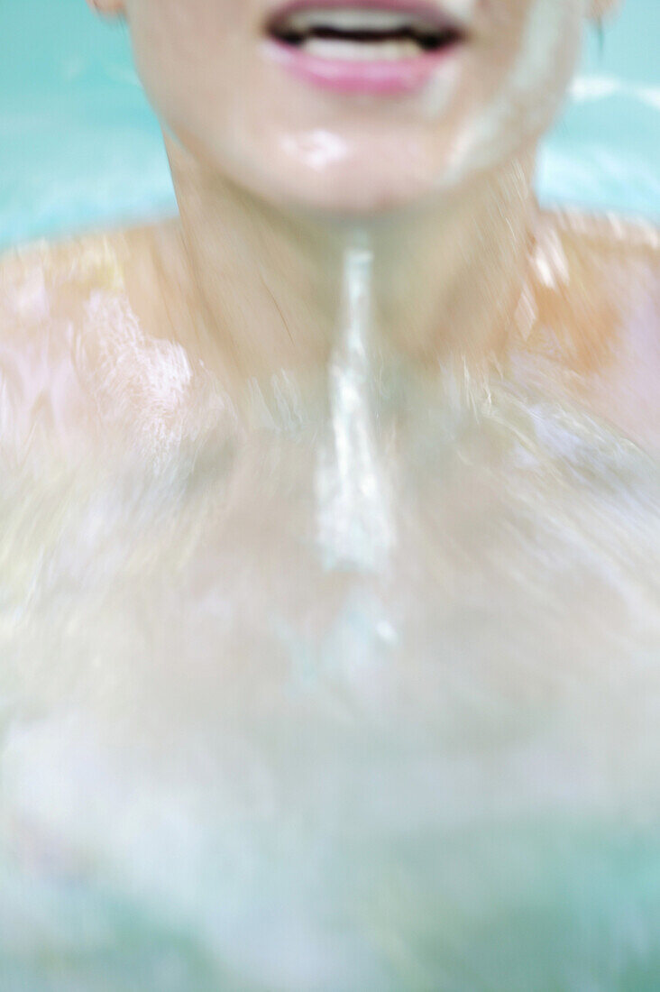 Mid adult woman bathing in a swimming pool, Styria, Austria