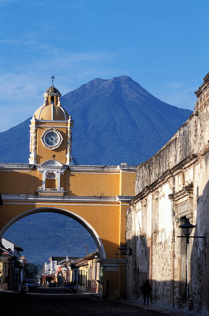 View along Arco de St. Catarina, Volcan de Agua in background, Antigua Guatemala, Guatemala