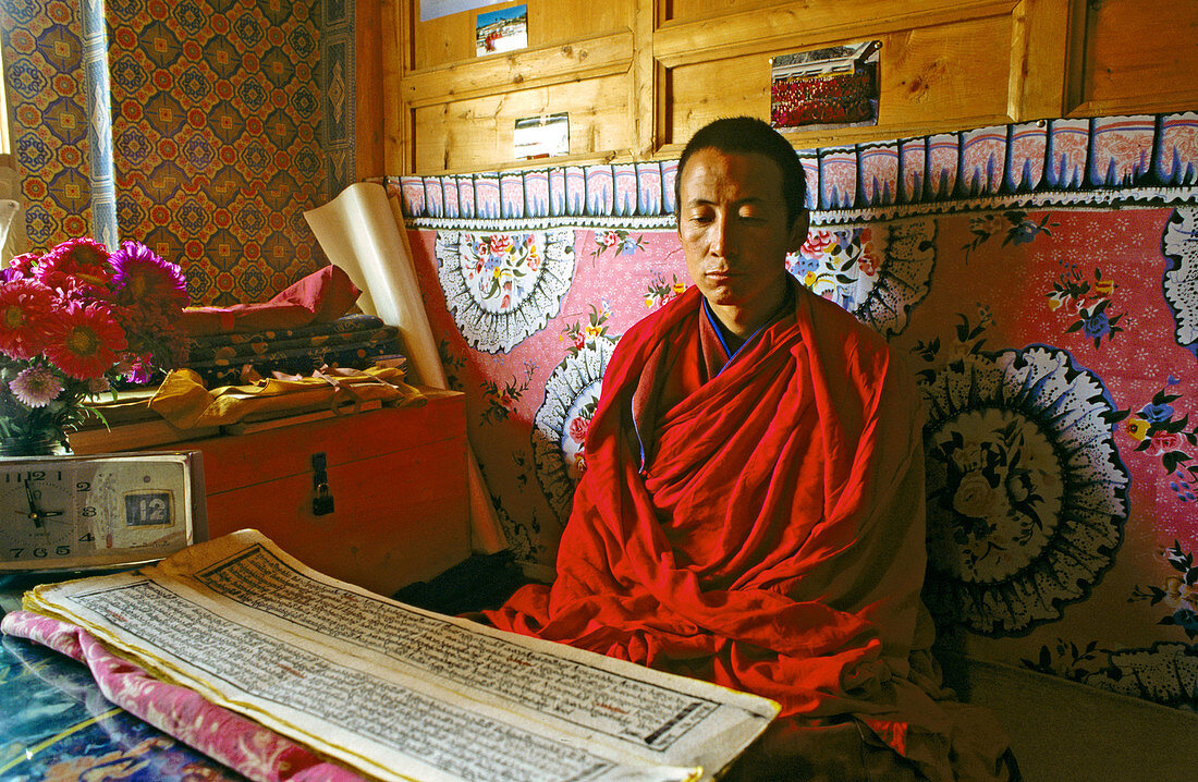 Lama in his room. Labrang Monastery in Xiahe. Gansu. China