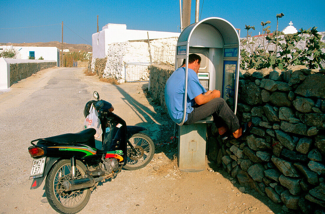 Man on the phone in Mikonos. Greece