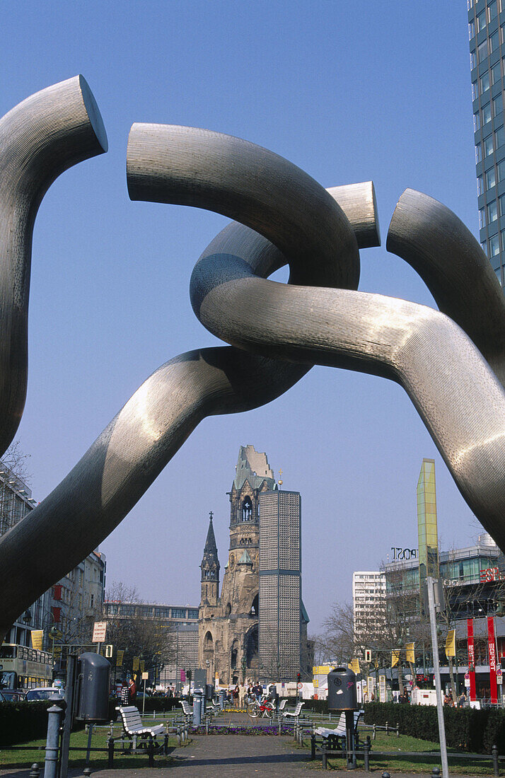 Plastic sculpture with the Kaiser Willhelm Gedachtniskirche at the background. Berlin. Germany