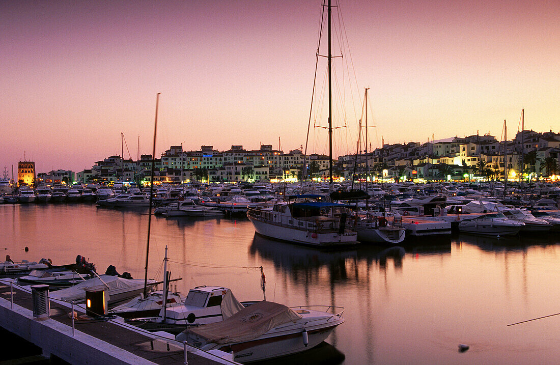 Puerto Banus at sunset. Marbella. Malaga province. Costa del Sol. Andalucia. Spain