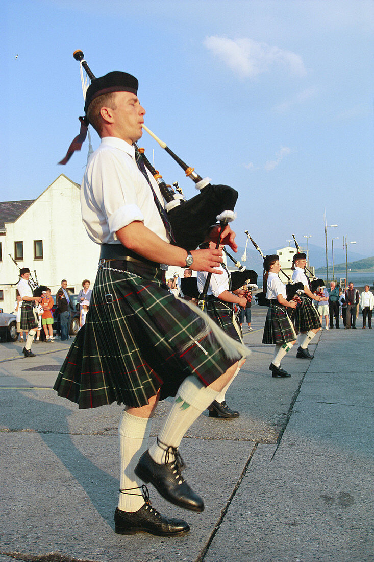 Pipe musicians at Ullapool. Highlands. Scotland