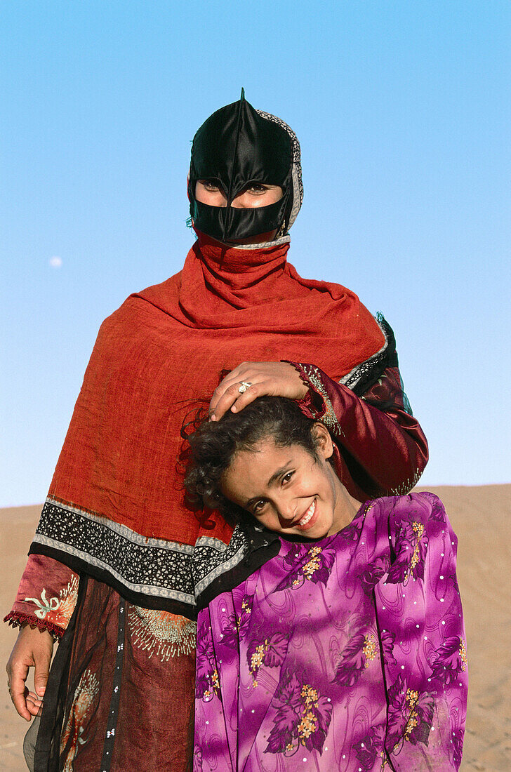 Beduin woman and girl. Washiba Sands. Oman
