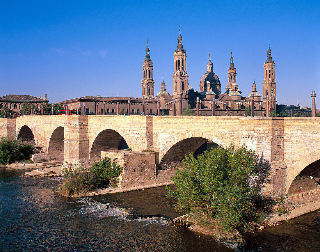 Pilar Basilica and stone bridge. Zaragoza. Aragon. Spain.