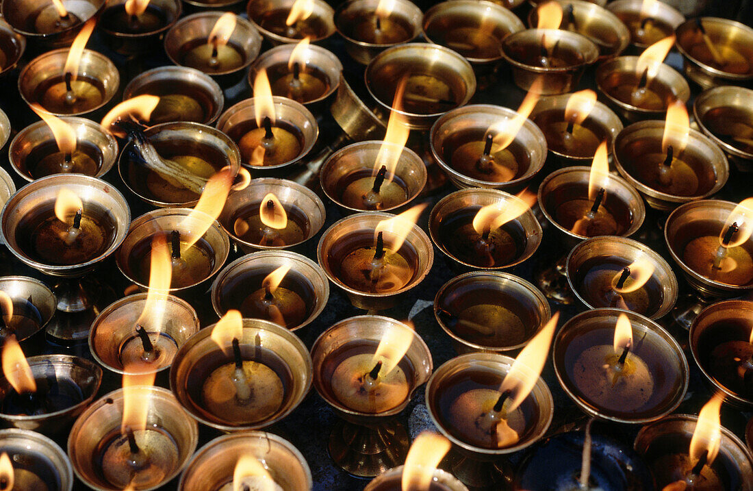 Always lit oil lamps at Eastern entrance of Swayambhunath Buddhist Stupa, Katmandu, Nepal.