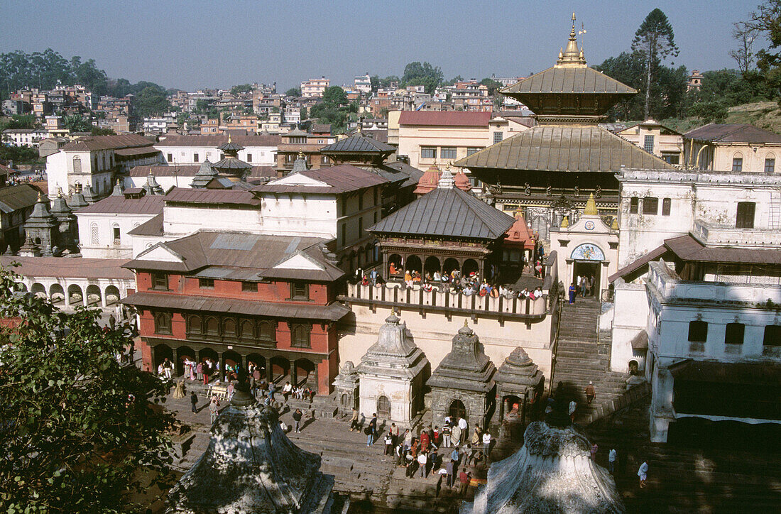 Cremation ghats on the banks of Bagmati River, Lord Shiva Pashupatinath Hindu Temple, Katmandu, Nepal.