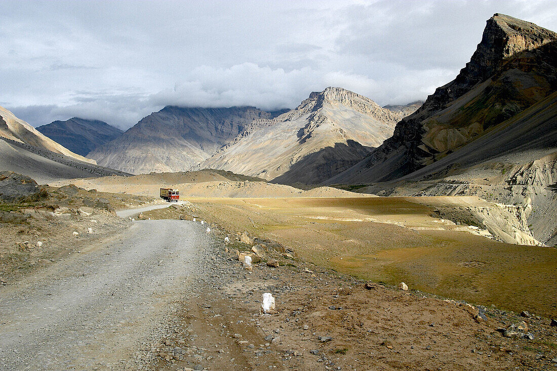 Tata trucks on the road between Kaza and Kunzum La. Spiti Valley, Himachal Pradesh. India