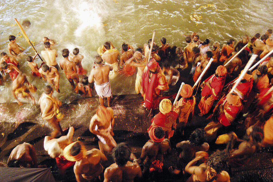 Sadhus taking holy dip during the Kumbh Mela (2003). Trimbakeshwar, near Nasik. Maharashtra. India