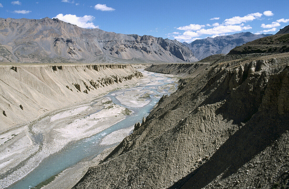 Indus River flowing between valleys in Ladakh, Jammu & Kashmir, India.
