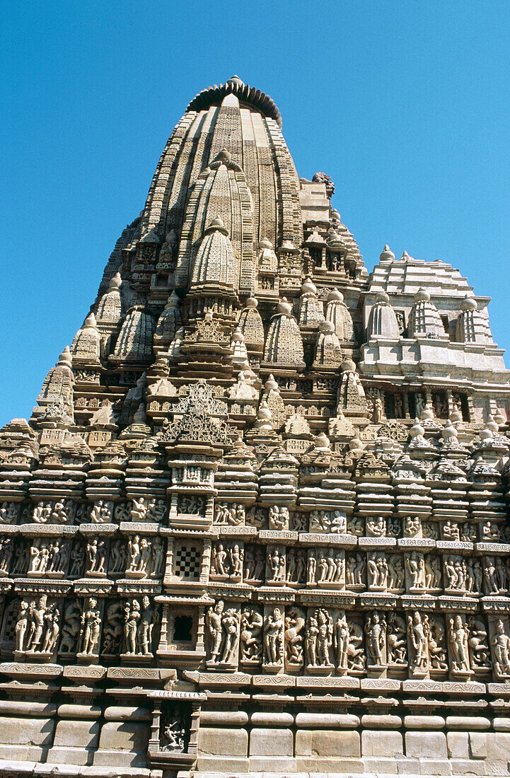 Ornate sculptures and pinnacle, Paraswanath Temple, Khajuraho. Madhya Pradesh, India