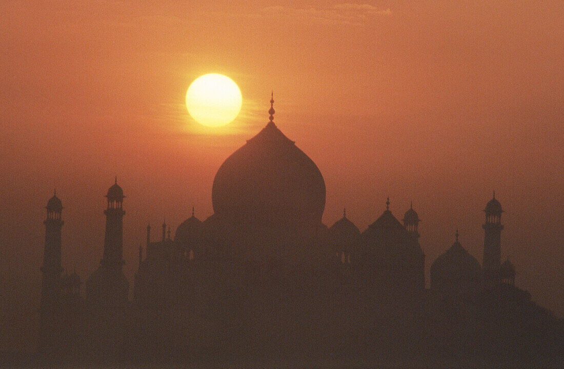 Taj Mahal at sunrise with early morning mist, Agra. Uttar Pradesh, India