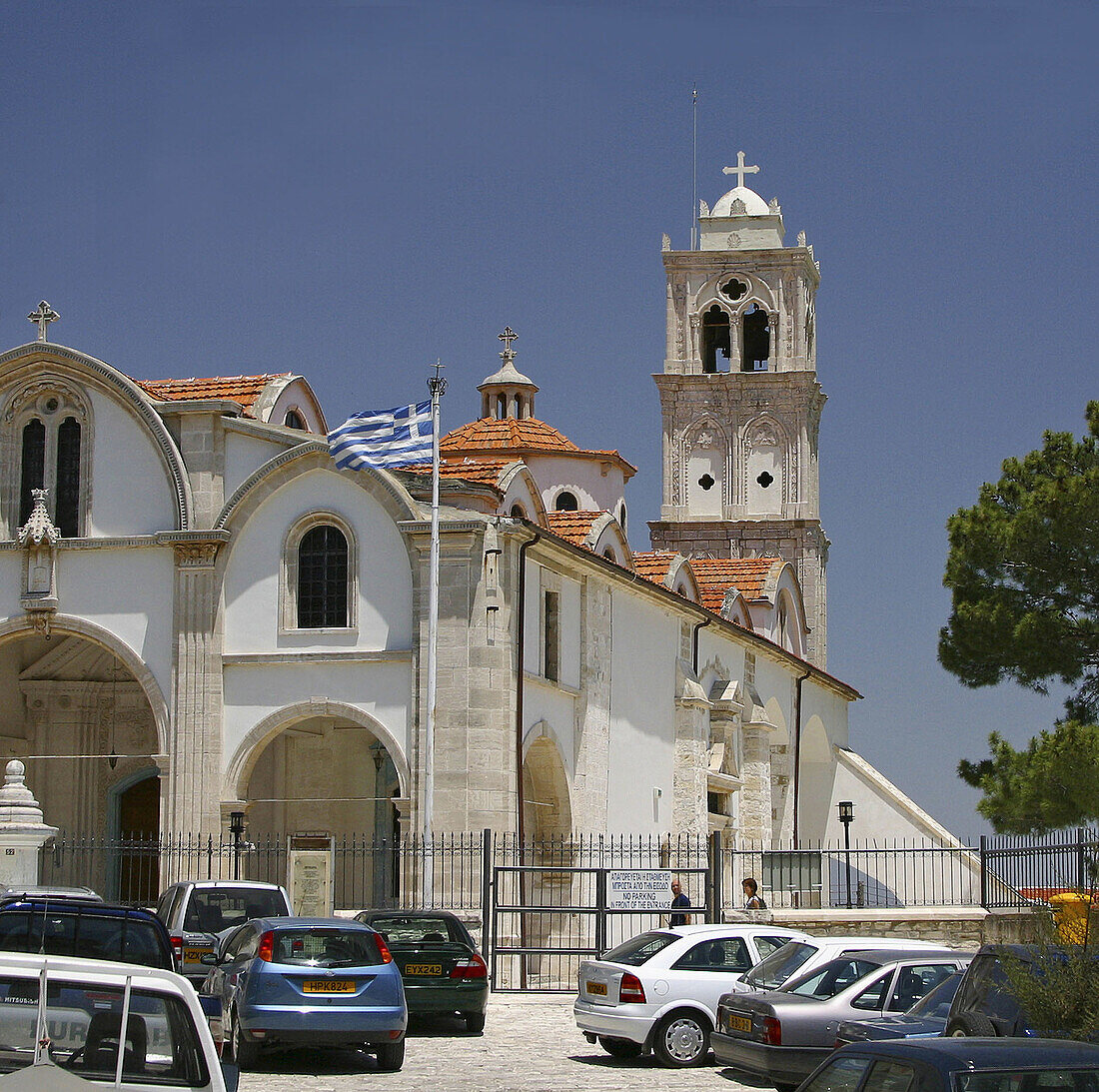 Church in Lefkara and Greek flag. Cyprus