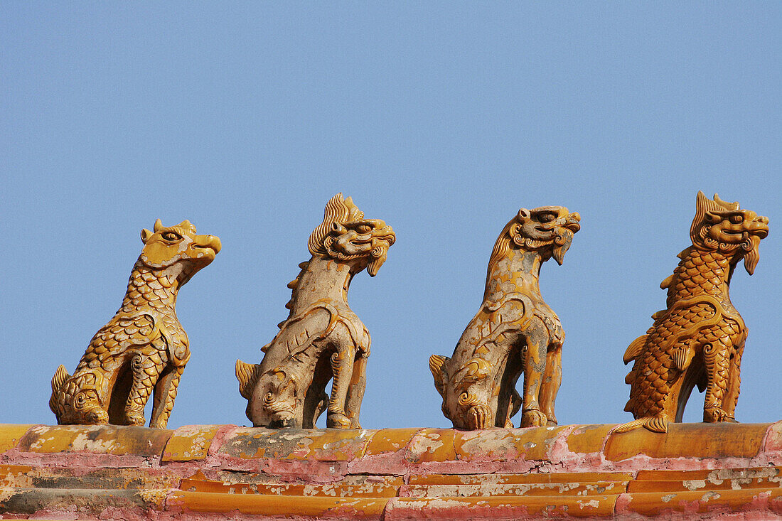 Ceramic figures on rof top. Forbidden City.