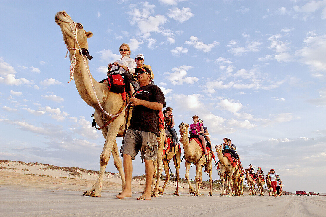 Sunset camel ride along the beach. Broome. Western Australia. Australia.