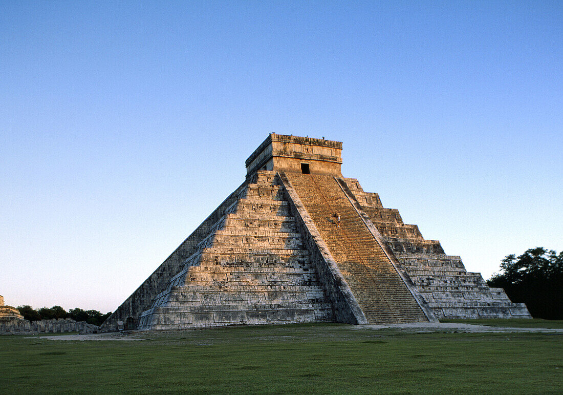 The Pyramid of Kukulcan (El Castillo) at the sunset (UNESCO World Heritage). Chichen Itza. Yucatan. Mexico.