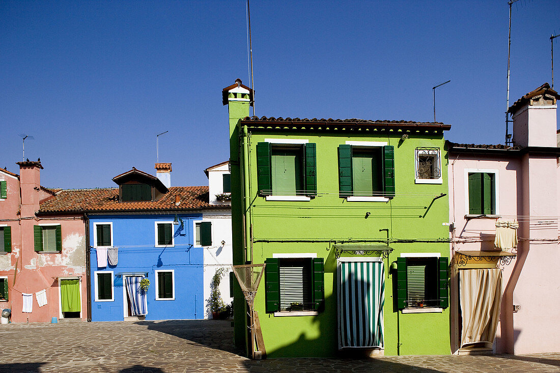 Laguna (lagoon) di Venezia. Burano. The typical colourful houses. Venice. Italy