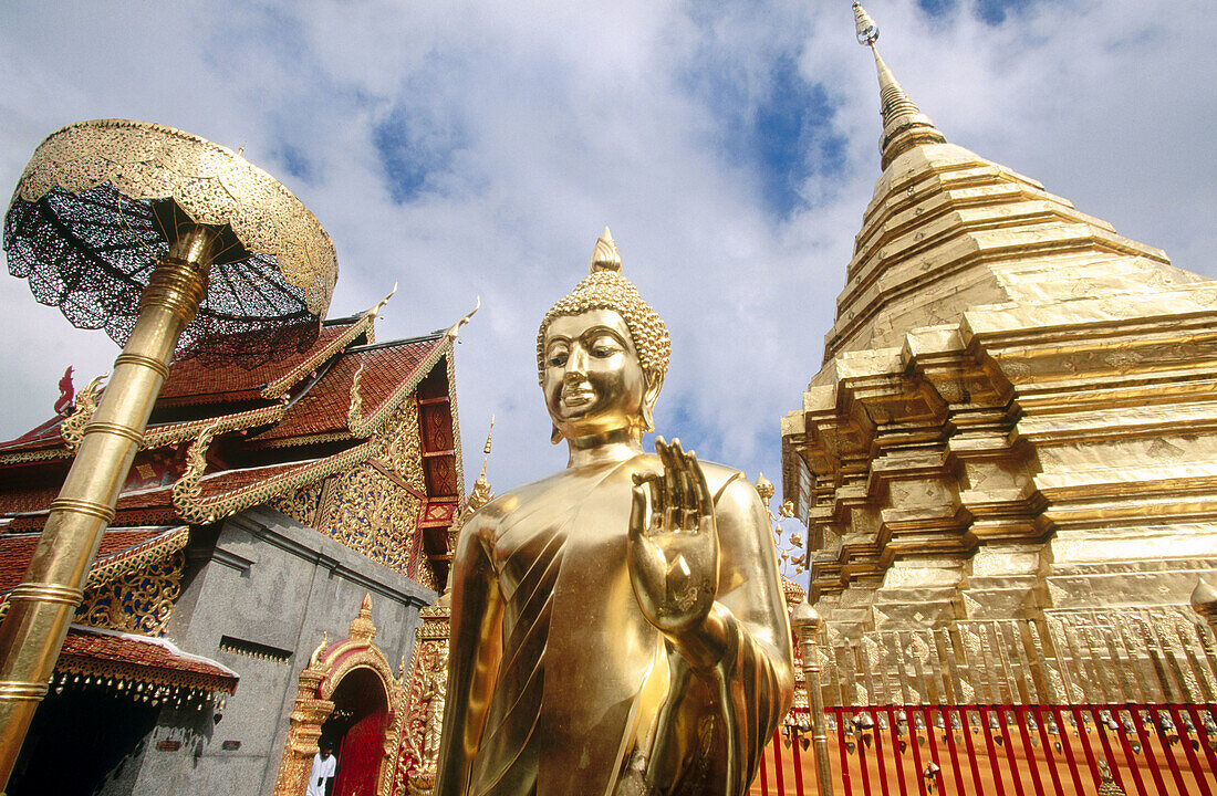 Buddha image and Wat Phra That Doi Suthep temple. Chiang Mai province. Thailand.