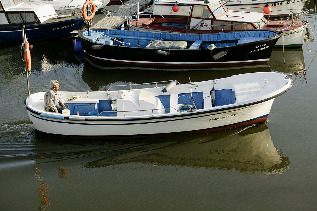 Little boat entering into Arriluce port. Neguri. Algorta. Getxo. Bizkaia. Basque Country. Spain