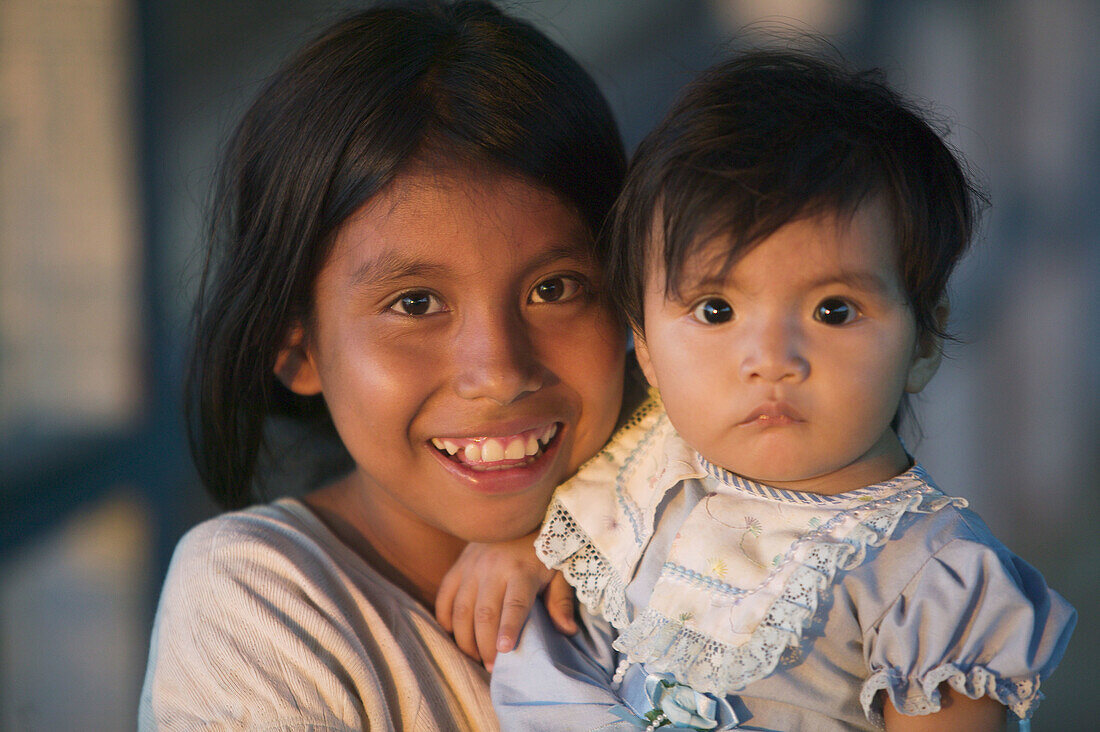 Girls with indigenous features. Iquitos. Peru