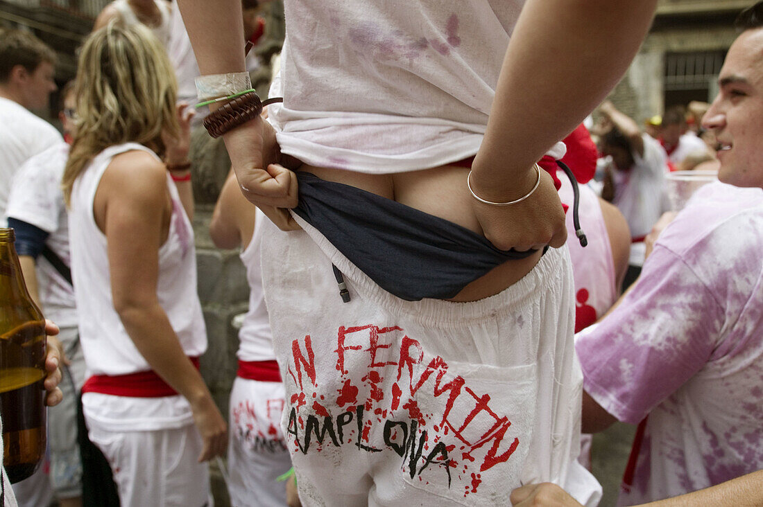 Showing backside in the Chupinazo . the opening ceremony of the San Fermin Festival. Pamplona. Navarre, Spain