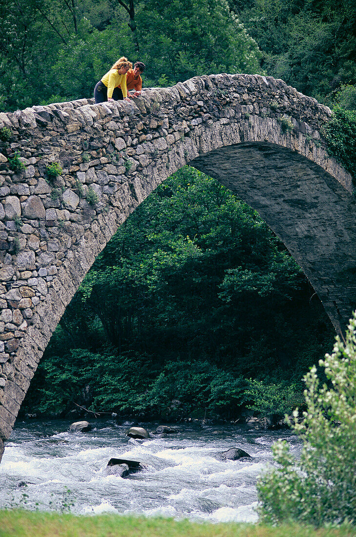 Couple on Margineda bridge. Sant Julià de Loira. Andorra