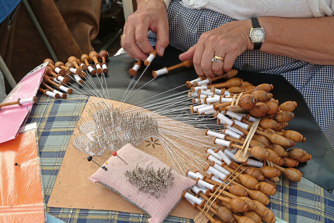 Bobbin lace maker. Trammelant festival, Belle Epoque style. Coq-sur-Mer. Belgium.