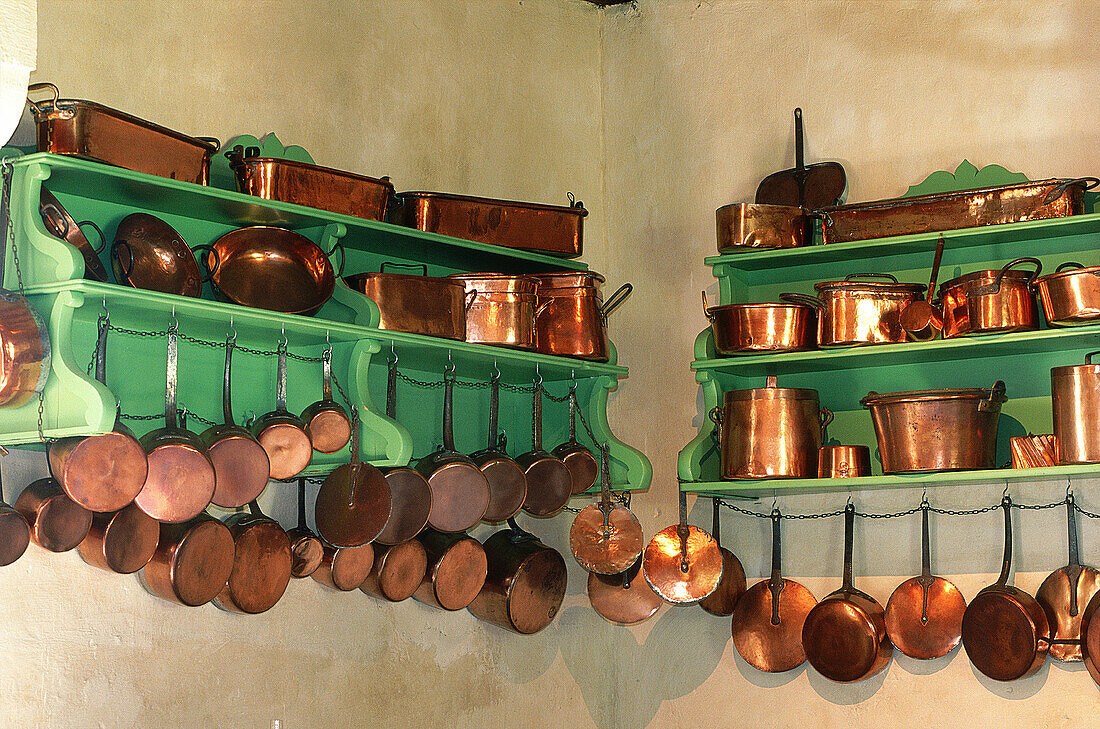 Copper cooking utensils in the kitchen of Château de Champchevrier. Touraine, Val-de-Loire. France