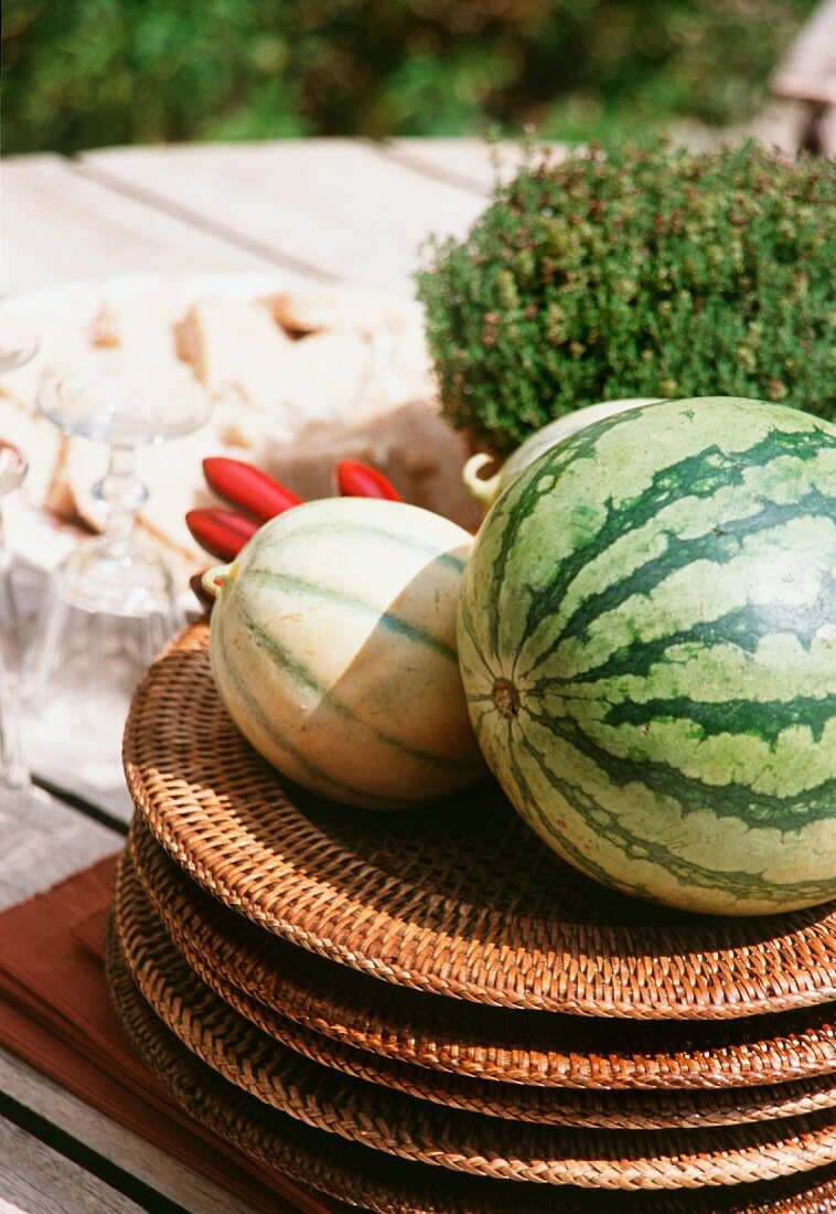 Melons on wicker plates