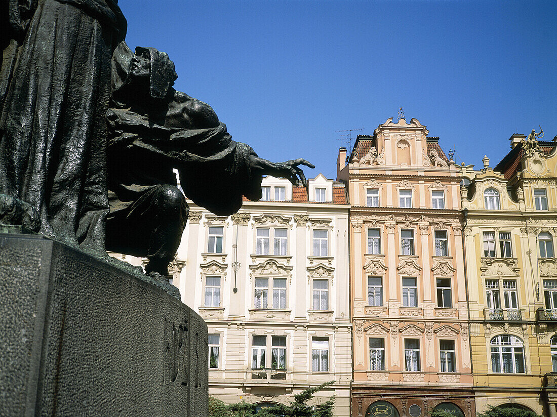 Detail of Jean Hus statue and Staromestské Namesti (Old Town Square). Prague. Czech Republic