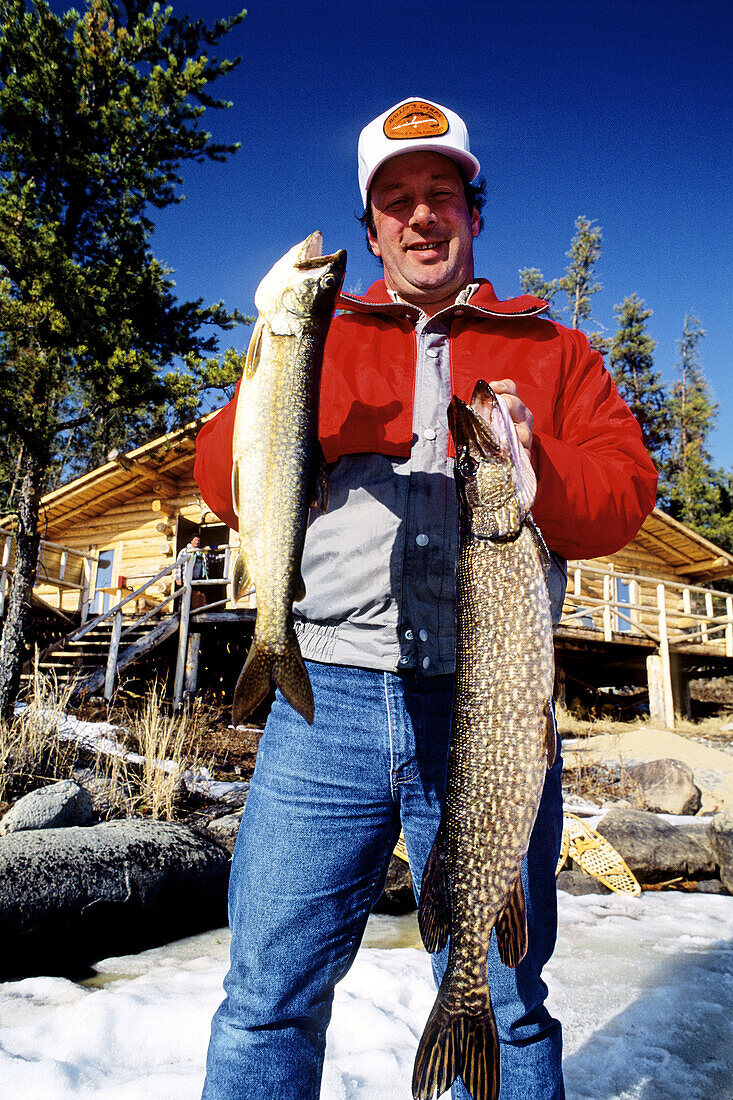 White fishing at Halley s camp in winter. Sunset county. Ontario. Canada