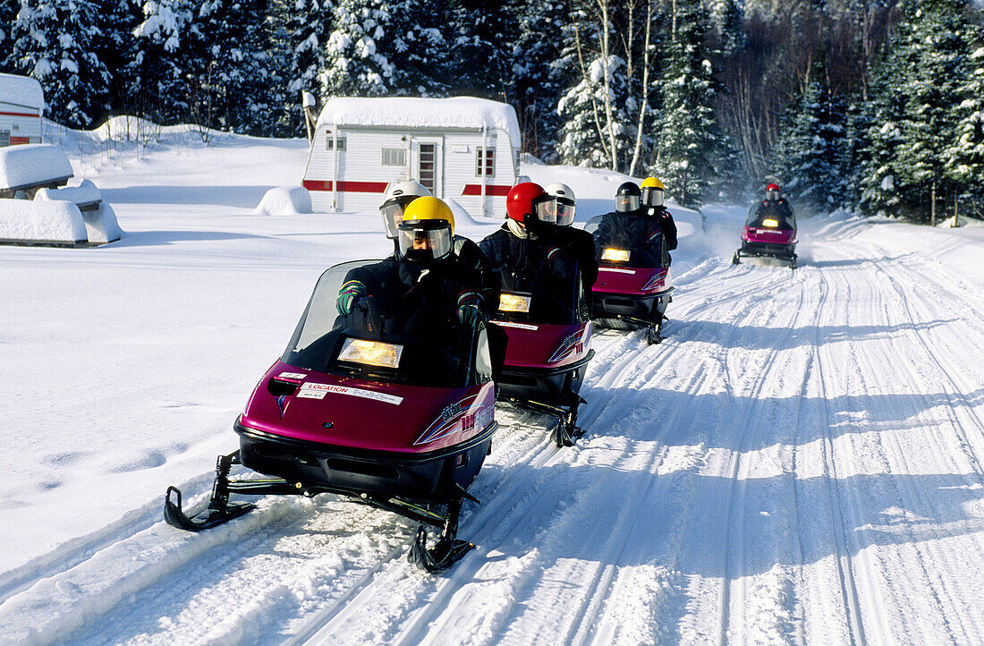 Snowmobile near Lac Saint Jean in winter. Quebec. Canada