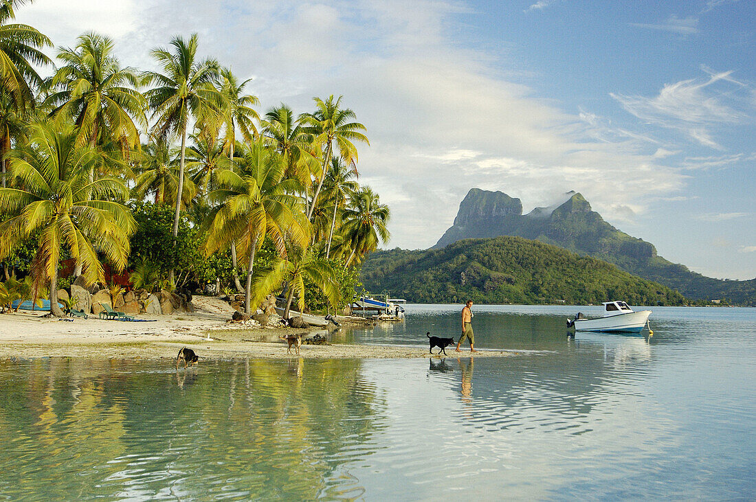 Teva Victor, son of Paul-Emile Victor, with family on an islet named Private island where he runs a rental house. Bora Bora island. French Polynesia . South pacific