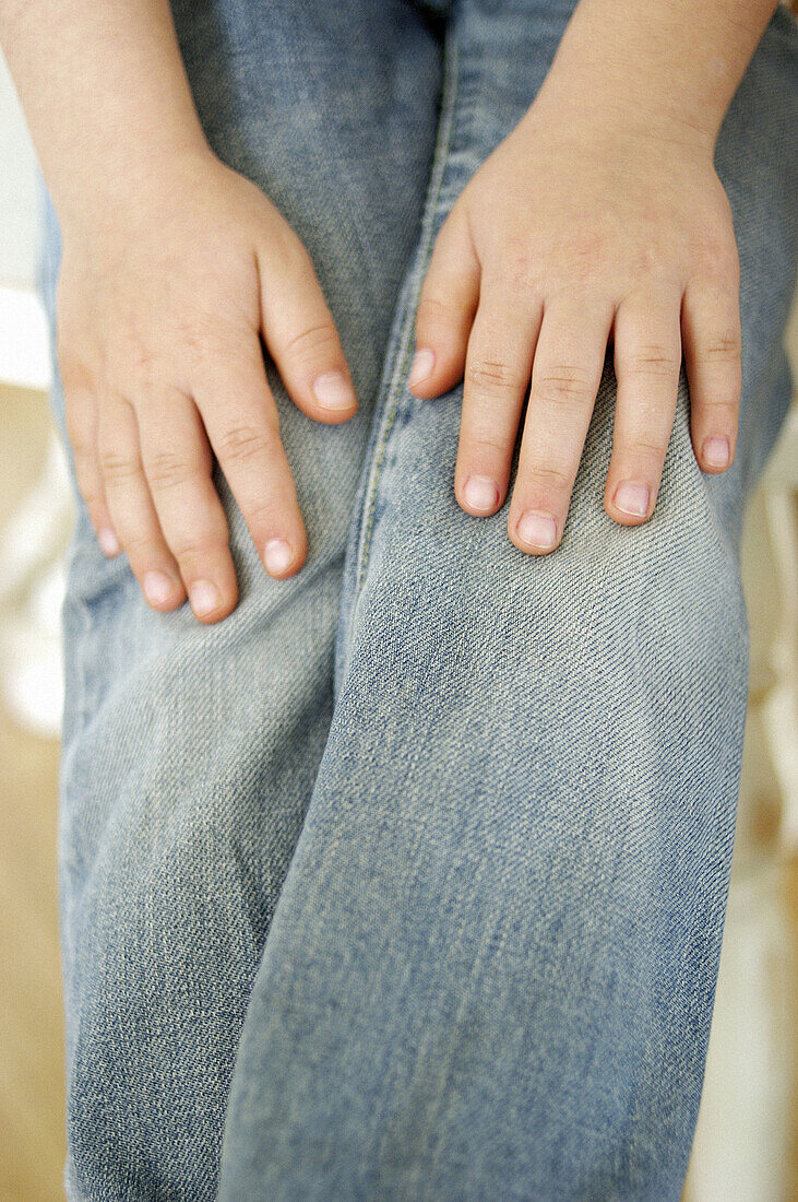  Blue jean, Blue jeans, Child, Children, Close up, Close-up, Closeup, Color, Colour, Contemporary, Denim, Detail, Details, Hand, Hands, Human, Indoor, Indoors, Inside, Interior, Jean, Jeans, Kid, Kids, Lean, Leaning, Leg, Legs, Motionless, One, One person